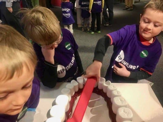 Keep Smiling at AAHOM - Teeth Brushing