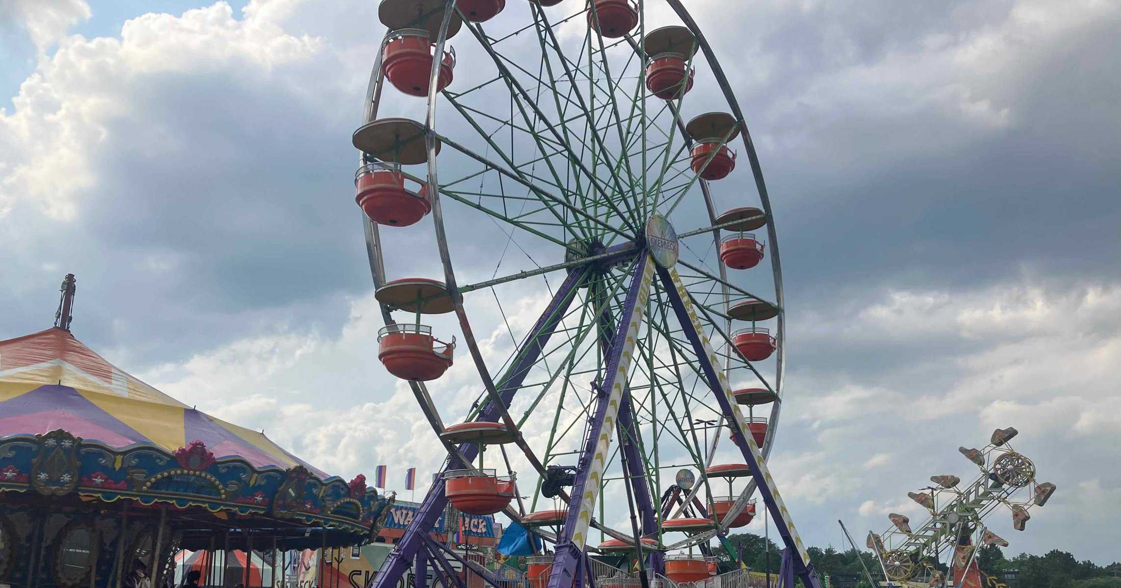 Ann Arbor Jaycees Carnival - Giant Ferris Wheel towers over the midway