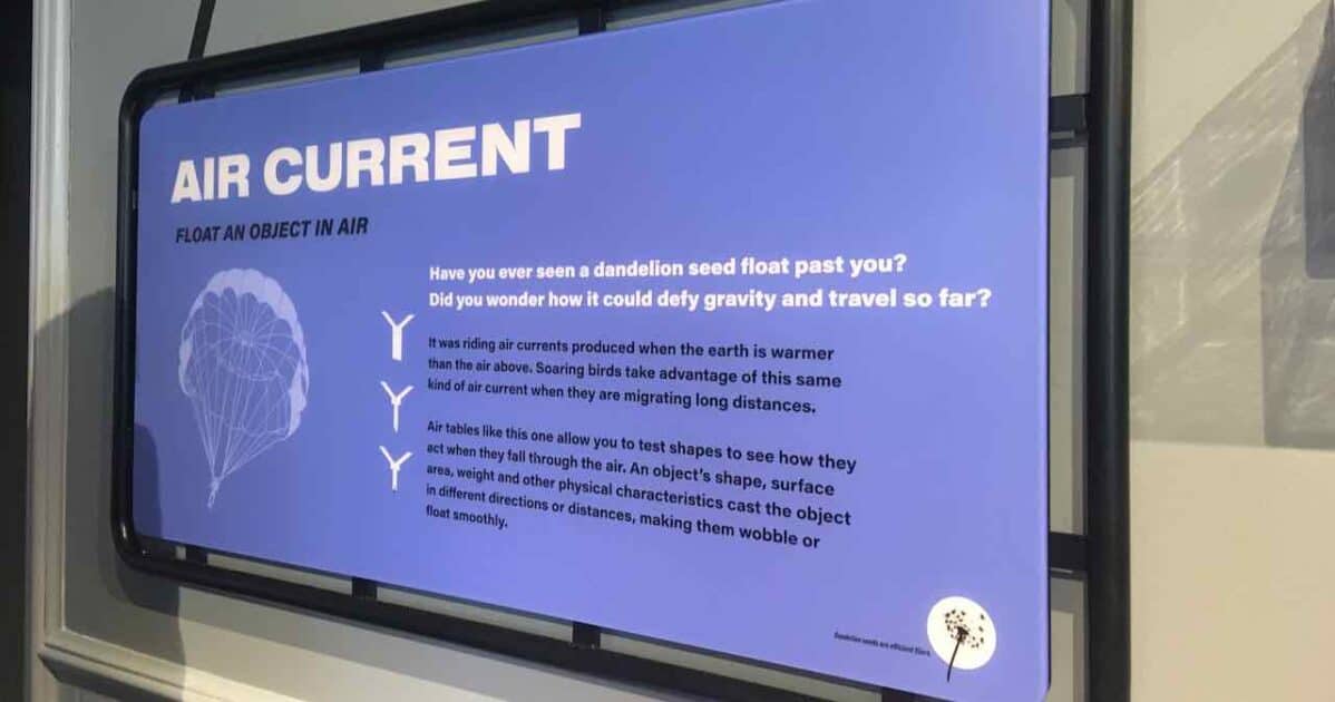 AAHOM STEAM PARK - Air Current Signage - Bottom right corner has dandelion