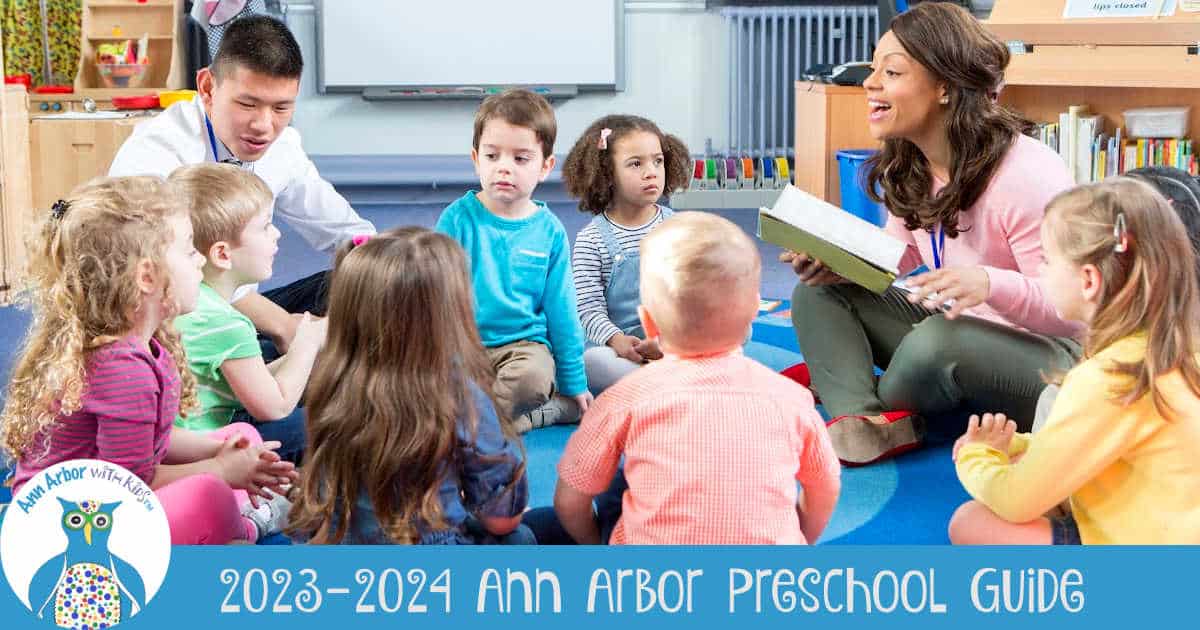 2023-2024 Ann Arbor Preschool Guide - Teacher reading story while preschoolers sit in a circle.