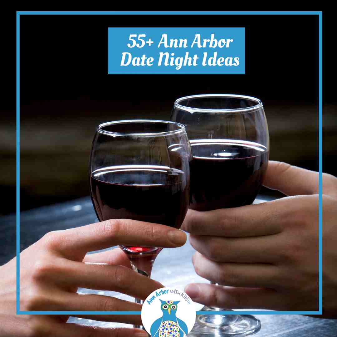 55+ Ann Arbor Date Night Ideas - Couple toasting with wine glasses