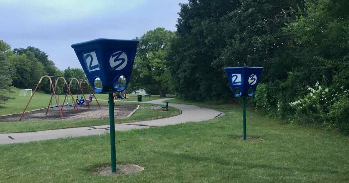 Dexter Community Park - Funnel Ball Hoops with swings beyond