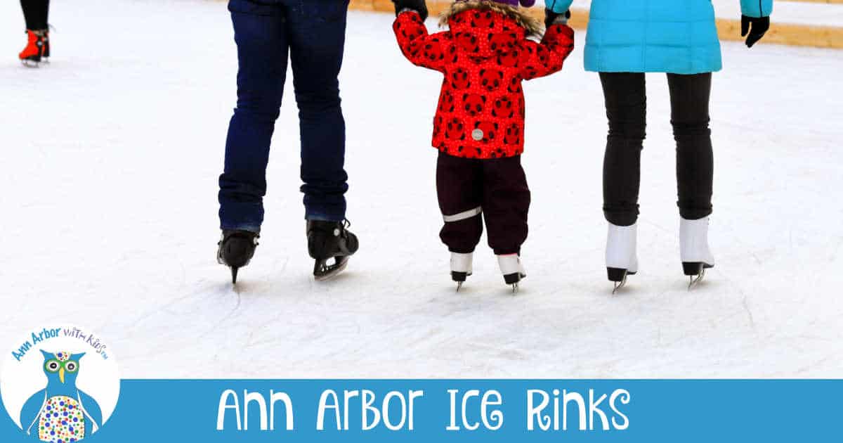 Ice Skating Rinks Near Ann Arbor - a child learns to skate while holding hands of two parents.