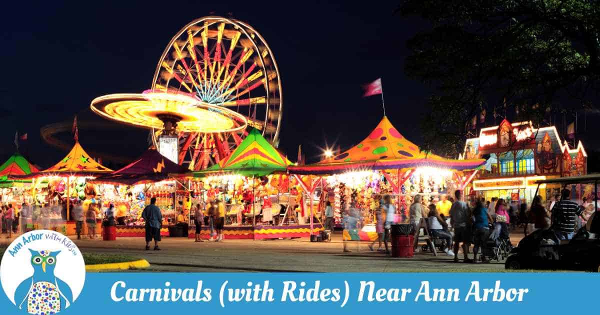 Carnivals and Fairs with Rides near Ann Arbor - Carnival Midway at night with ferris wheel, swings, funhouse, and games