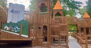 Timbertownm - playground showing Jiffy factory facade , ramp, towers