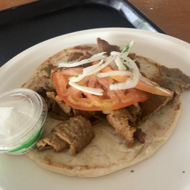 Ya'ssoo Greek Festival - Gyro open face on compostable plate with container of tzatziki sauce